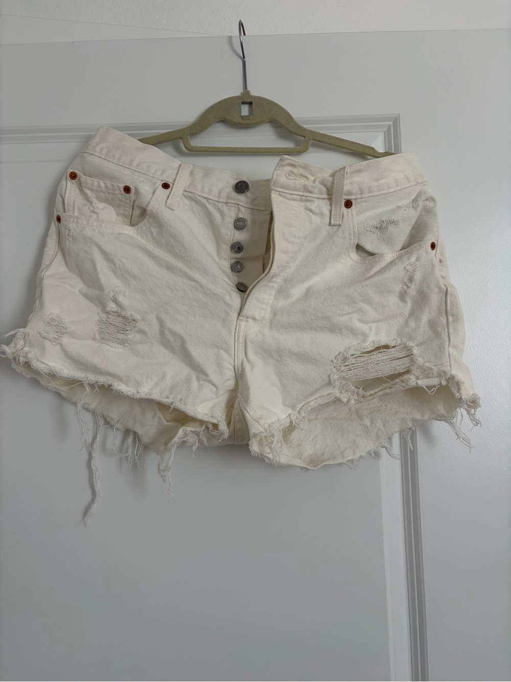 Levi's Cream Distressed Denim Shorts